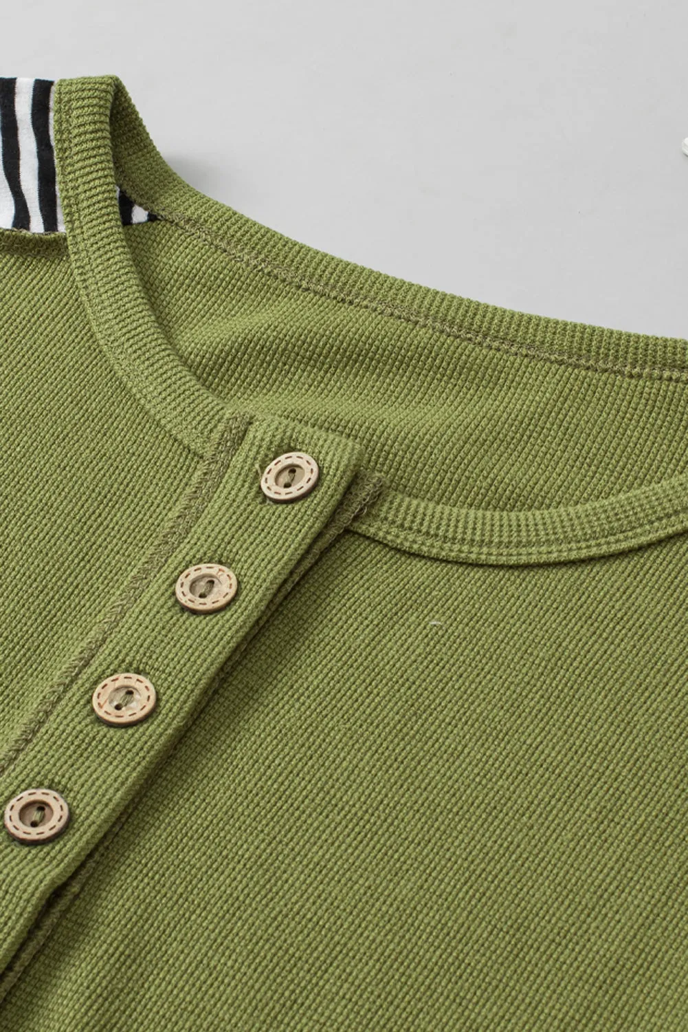 Kelly Striped Exposed Seam Half Button Sweatshirt