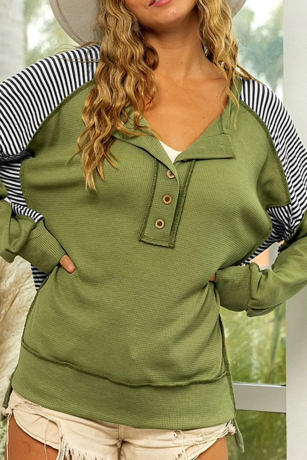 Kelly Striped Exposed Seam Half Button Sweatshirt