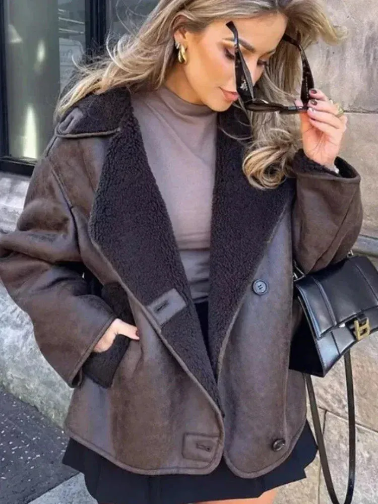 Oversized women's coat in leather with fur
