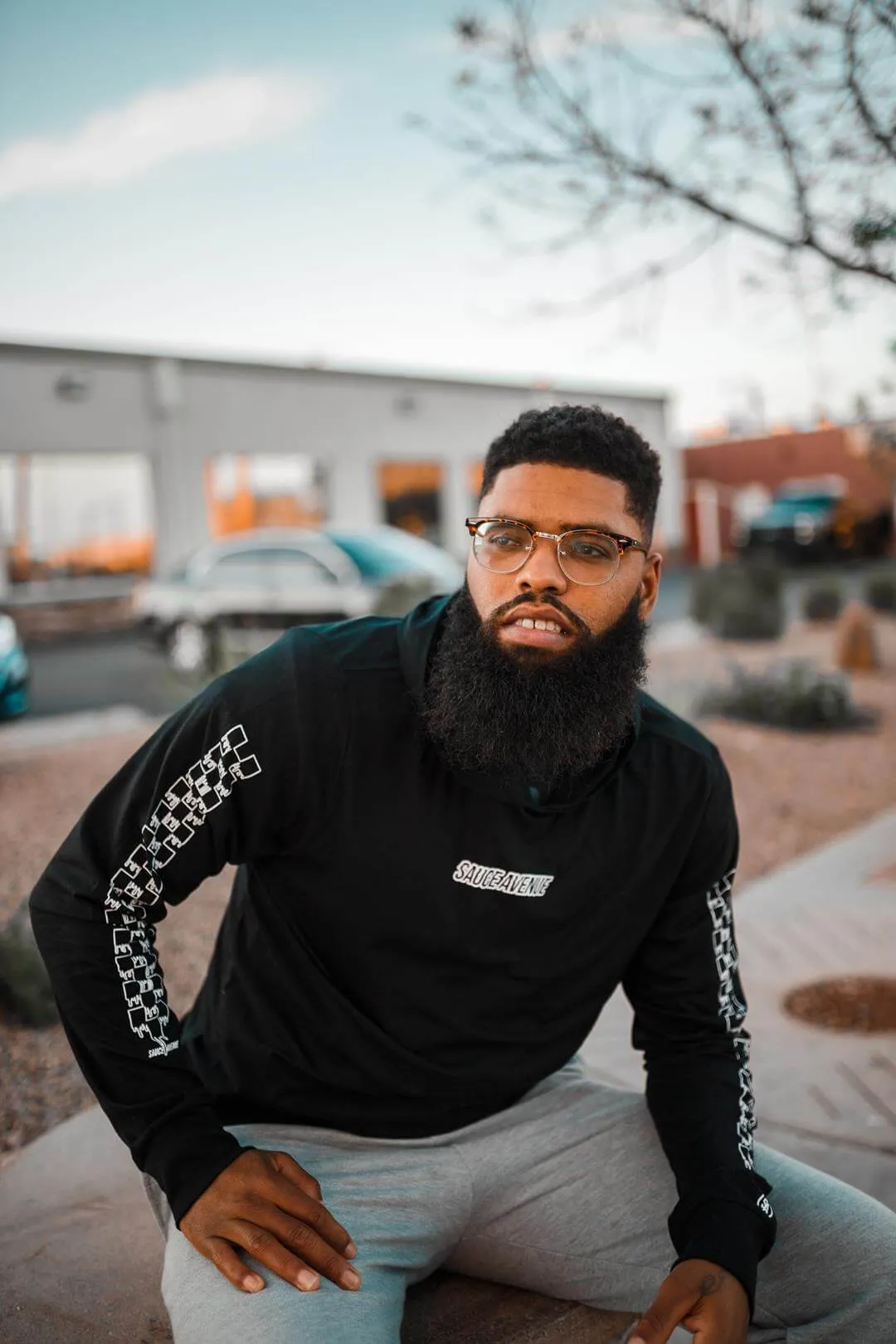 White SA Outline | Black Jersey Long Sleeve Hoodie (Outline Checkered Drippin Sleeve)