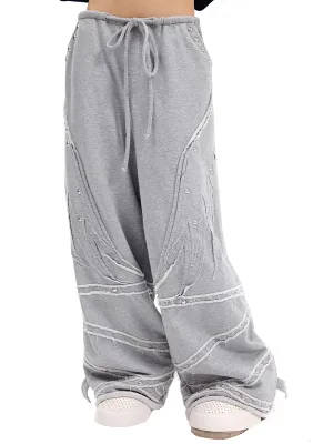 WINGS PATCHWORK SWEATPANTS