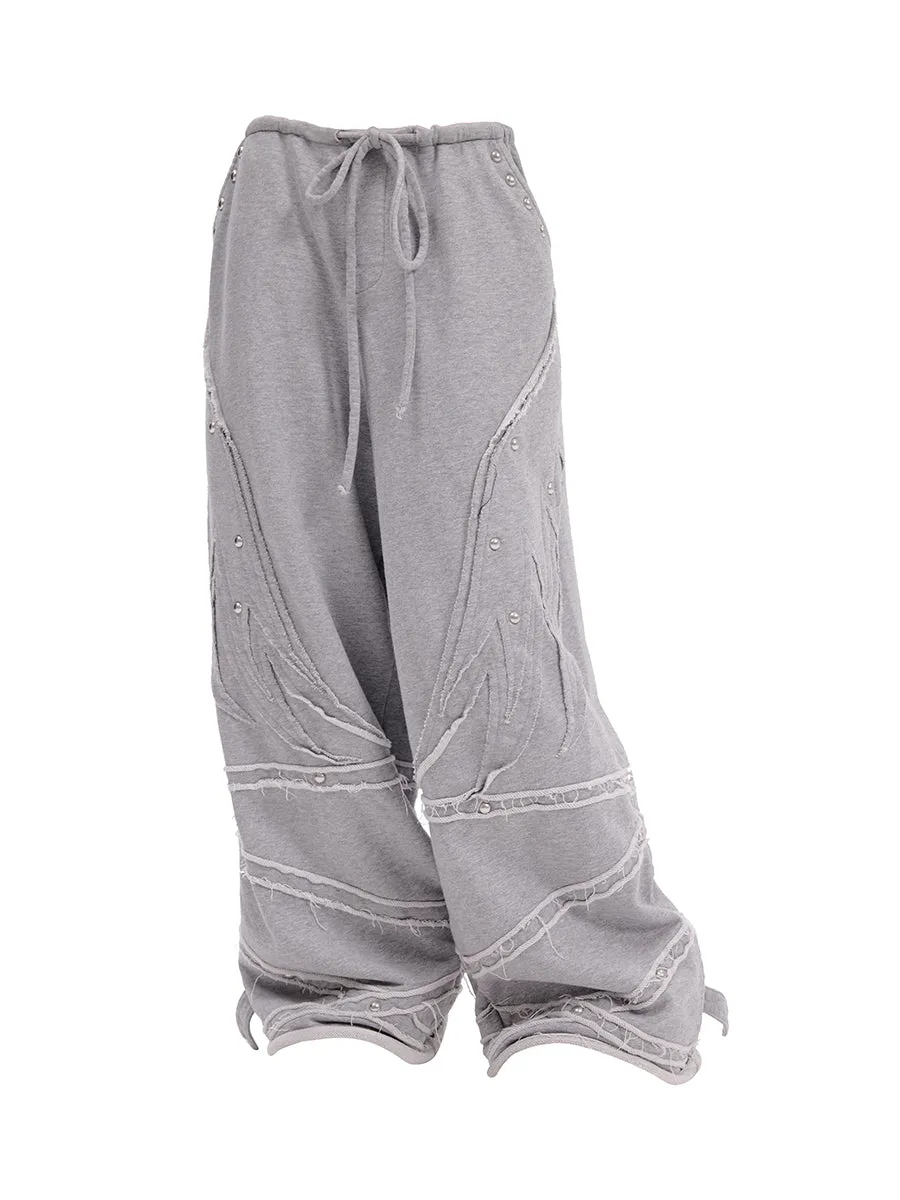 WINGS PATCHWORK SWEATPANTS